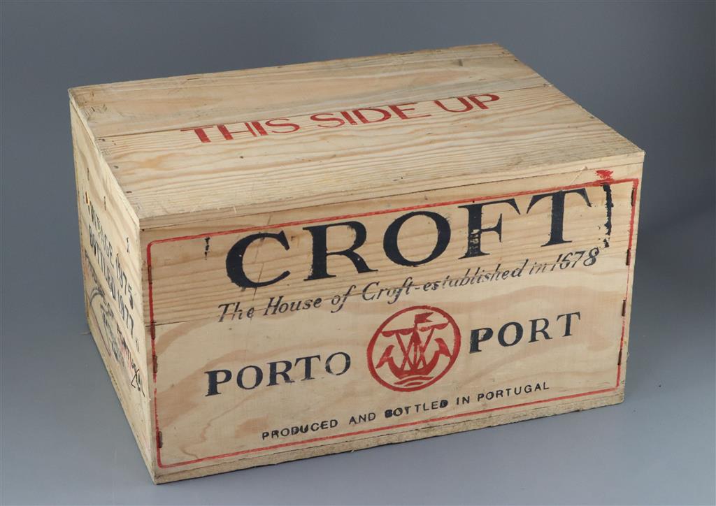 A case of Croft 1975 vintage Port, bottled 1977, original opened wooden crate (12 bottles)